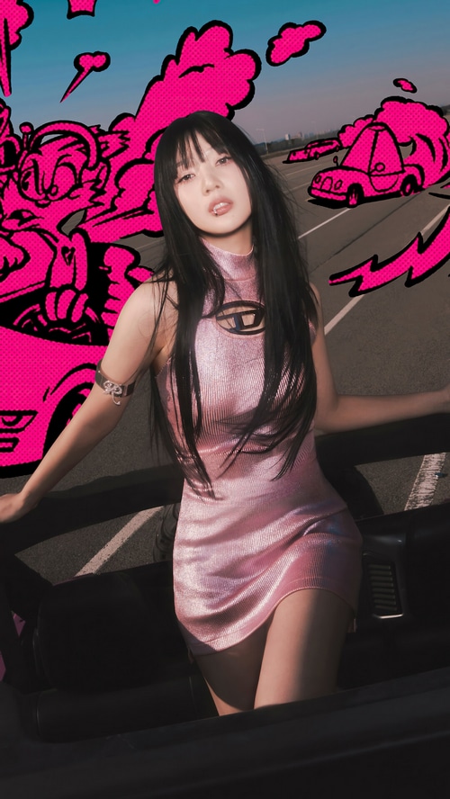 Joy from Red Velvet in a pink dress