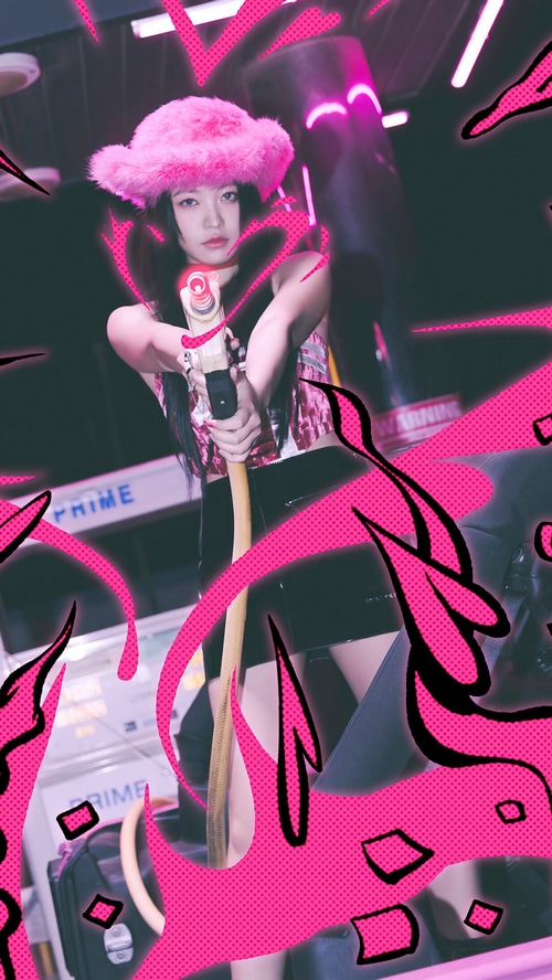Red Velvet's Yeri aims a water gun with pink accents