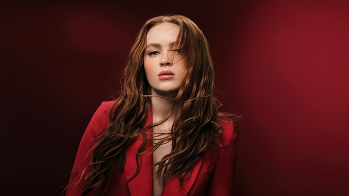 Sadie Sink in a red blazer