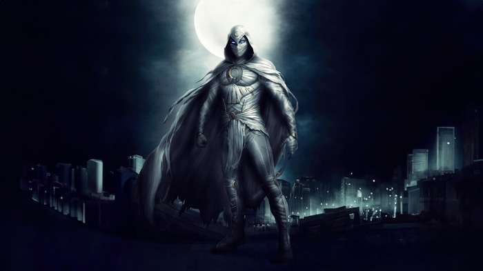 Moon Knight standing in a city at night