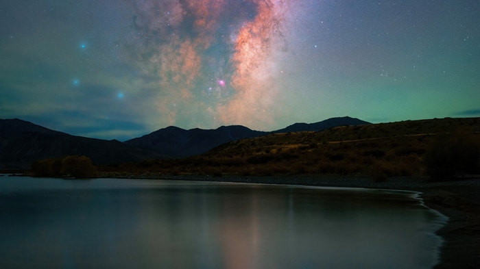 Mountains and Milky Way over a lake
