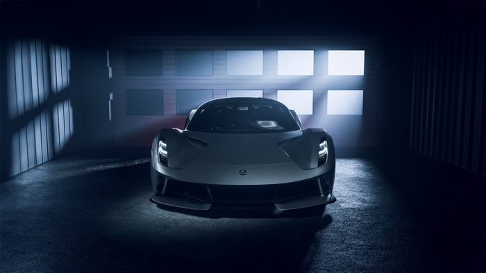 Lotus Evija electric hypercar in a dark garage