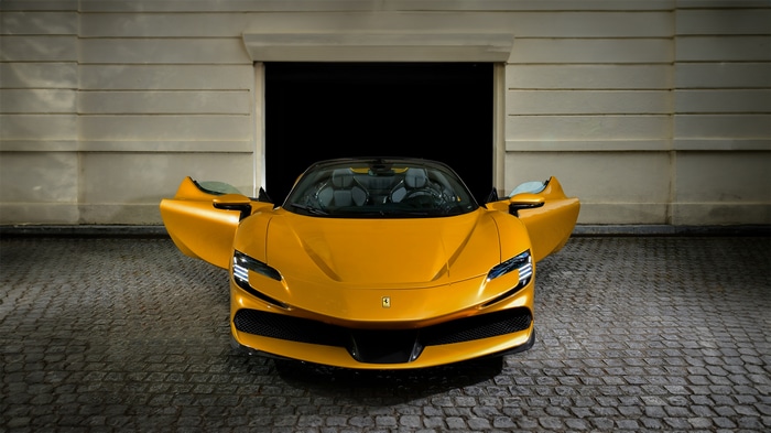 Yellow Ferrari SF90 Spider with Doors Open