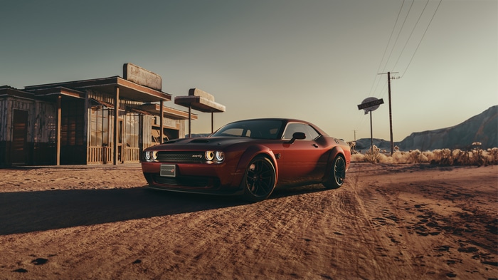 Red Dodge Challenger in a Desert Landscape