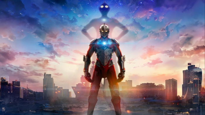 Ultraman standing in a city at sunset with a shadow figure behind