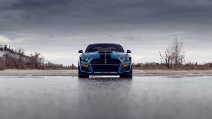 Blue Ford Mustang Shelby GT500 on Wet Road