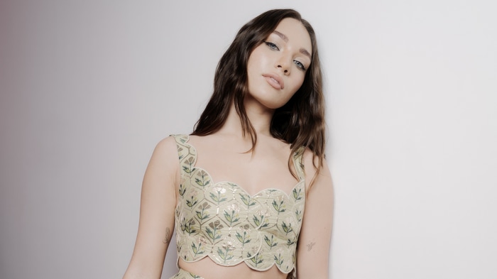 Maddie Ziegler in a patterned top