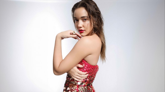 Olivia Ponton in a red sequined dress