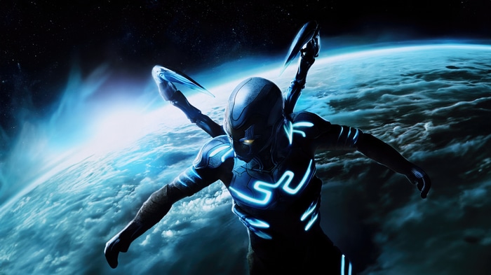 Blue Beetle in Space with Earth Below 4K