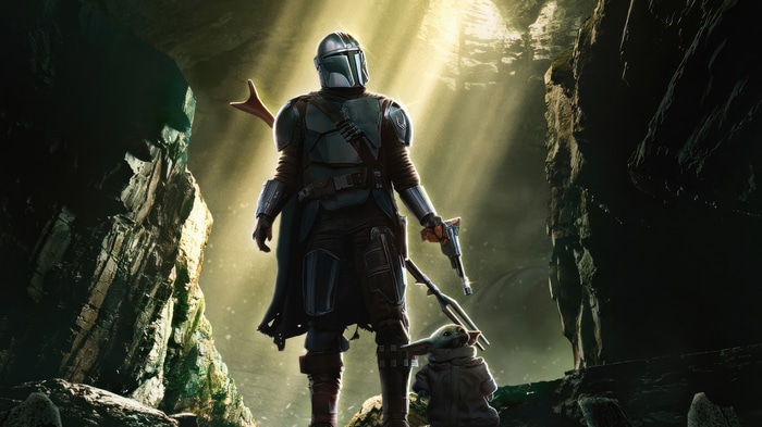 The Mandalorian and Grogu in a cave 4K