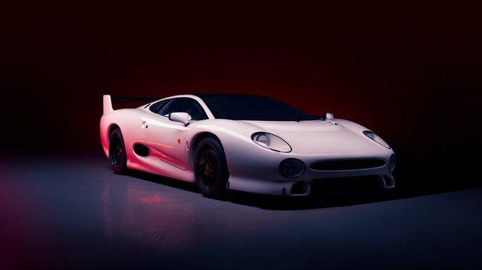 White Jaguar XJ220 supercar in studio lighting