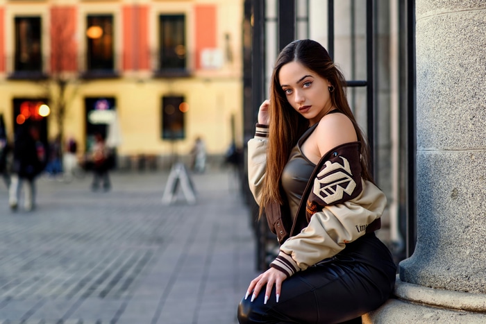 Model in a bomber jacket and leather pants