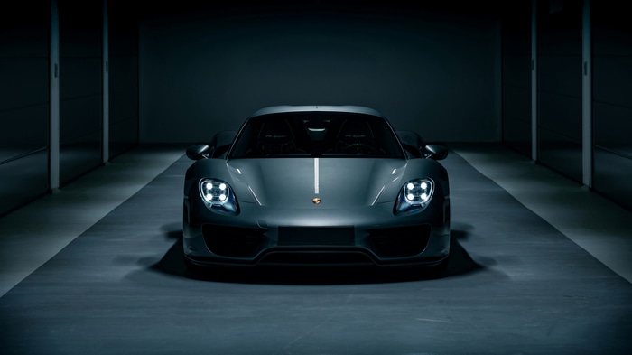 Porsche 918 Spyder in a dark garage