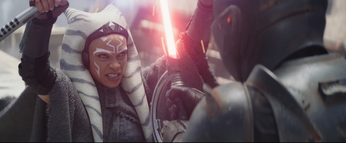 Ahsoka Tano fights with a lightsaber