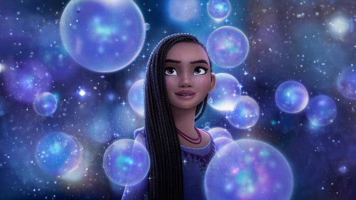 Asha surrounded by glowing orbs in Wish 4K
