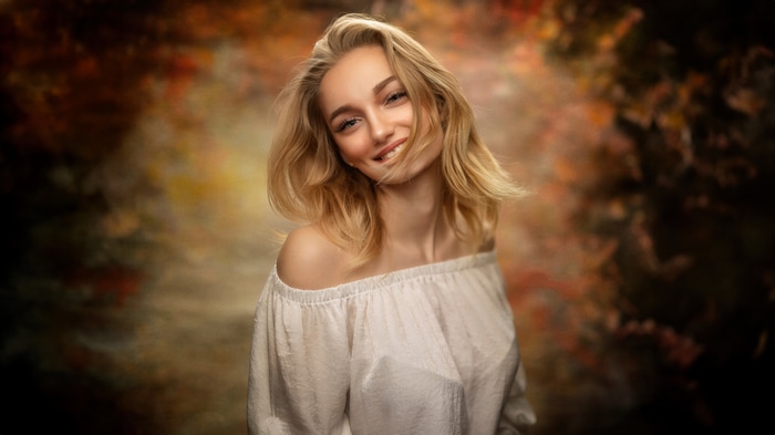 Cute blonde girl smiling in 4K