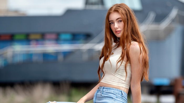Model with red hair and freckles