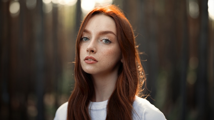 Redhead girl with freckles in 4K