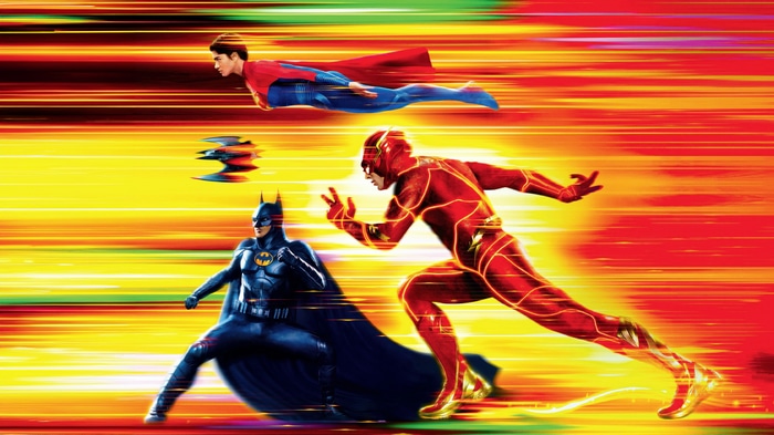 The Flash, Batman, and Supergirl in motion