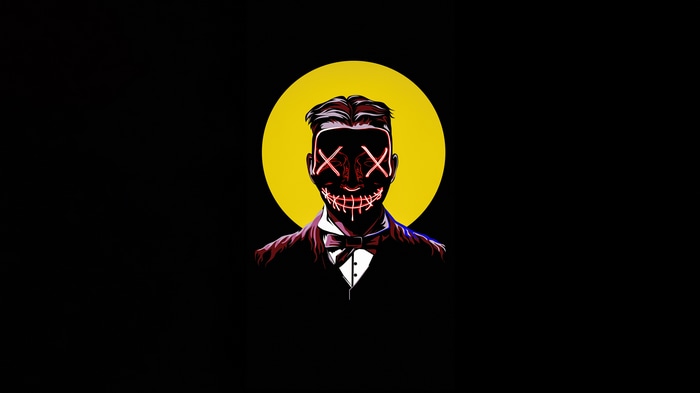 Man in a suit with a glowing mask