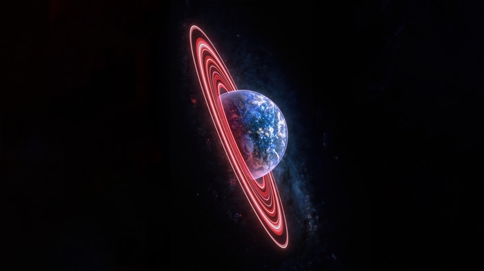 Planet with glowing red rings in space