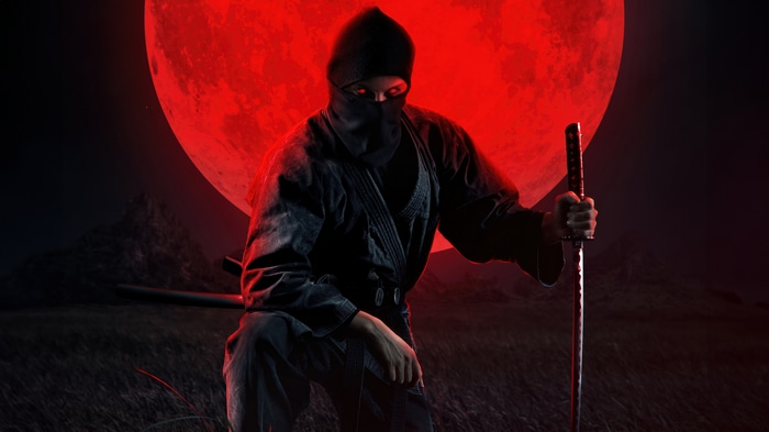 Ninja with Katana in front of Red Moon