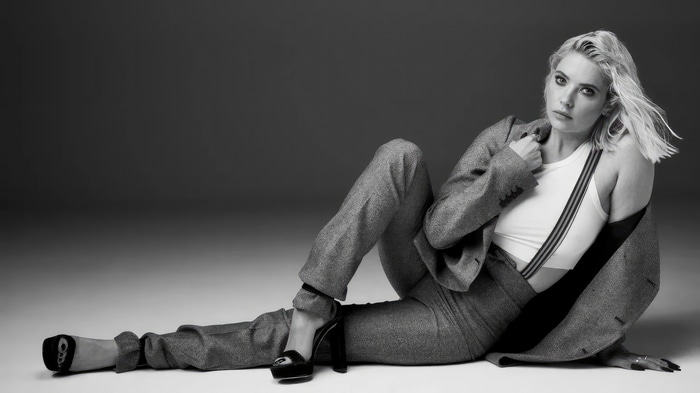 Ashley Benson in a grey suit