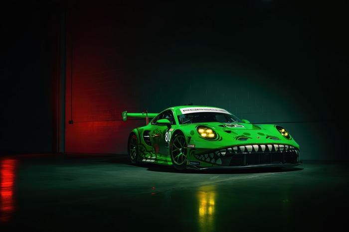 Green Porsche 911 GT3 R with dinosaur livery