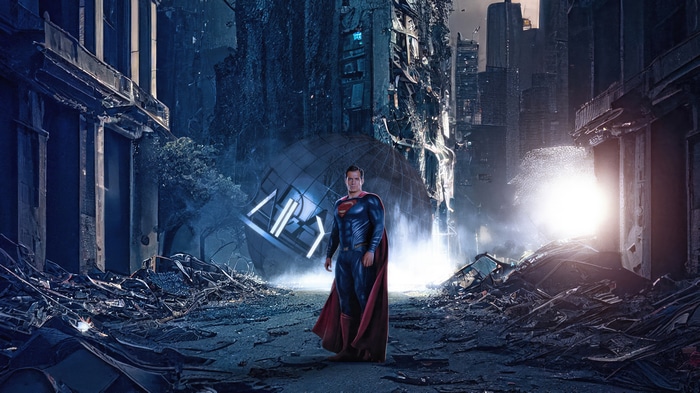 Superman in a destroyed city with a globe structure