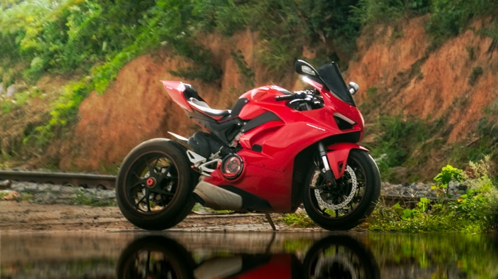 Red Ducati Motorcycle on Tracks