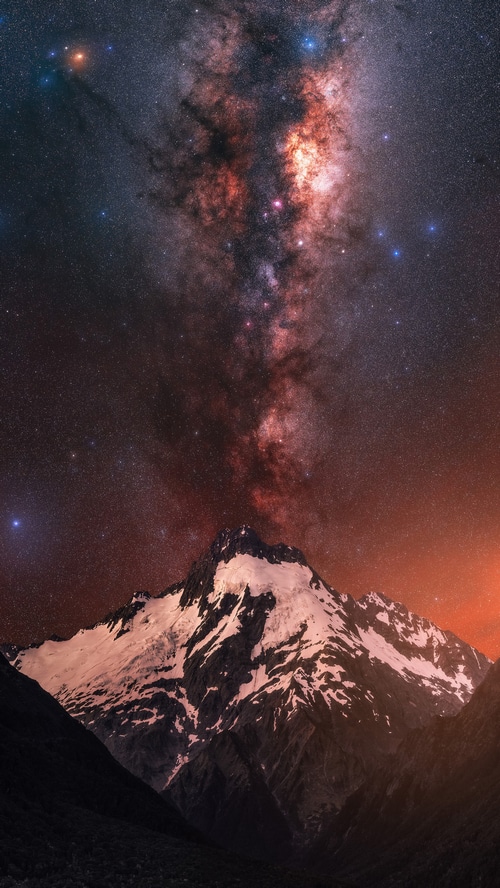 Milky Way over snow-capped mountains