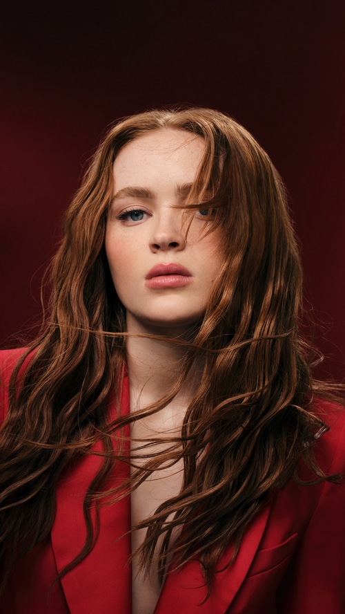 Sadie Sink in a red blazer