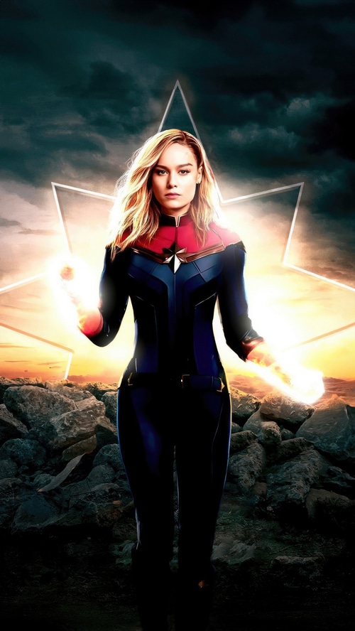 Captain Marvel with glowing hands and star symbol