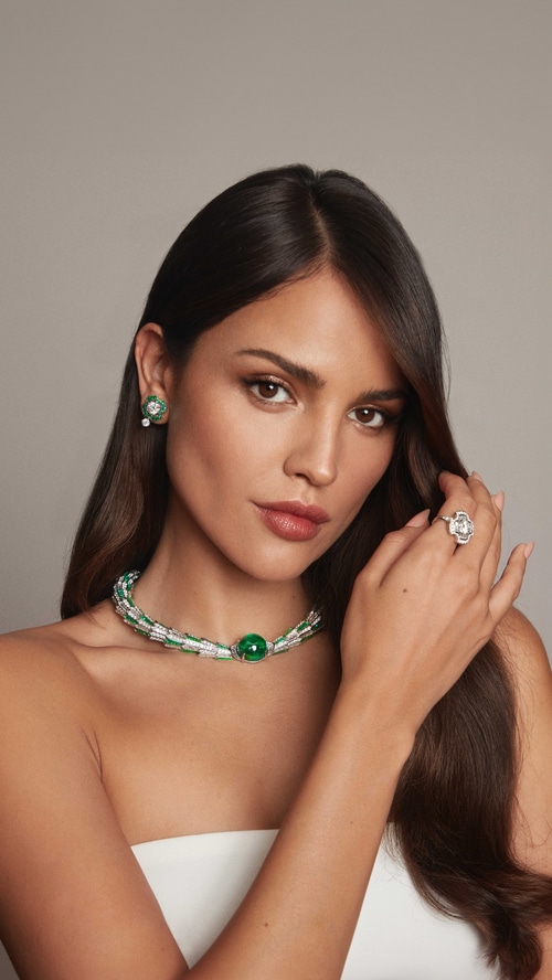 Eiza Gonzalez wearing emerald and diamond jewelry