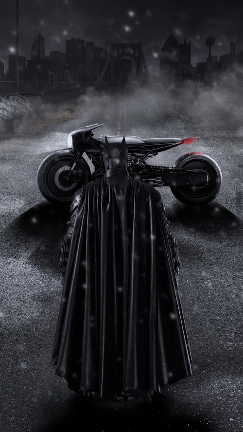 Batman and Batcycle in a foggy city