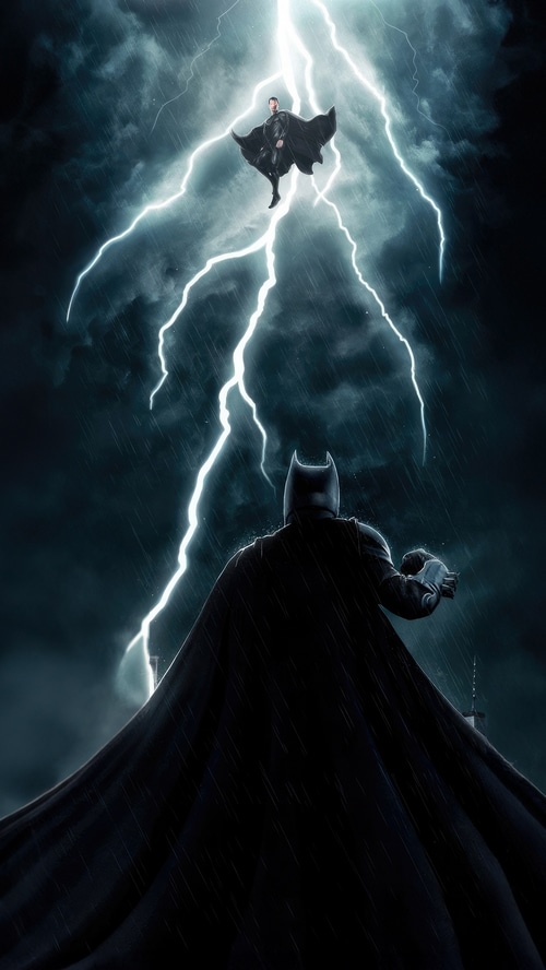 Batman and Superman in a lightning storm