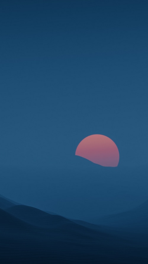 Sunset over misty mountains