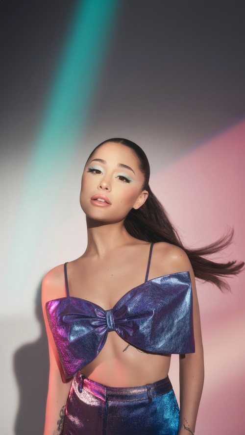 Ariana Grande in a metallic bow top