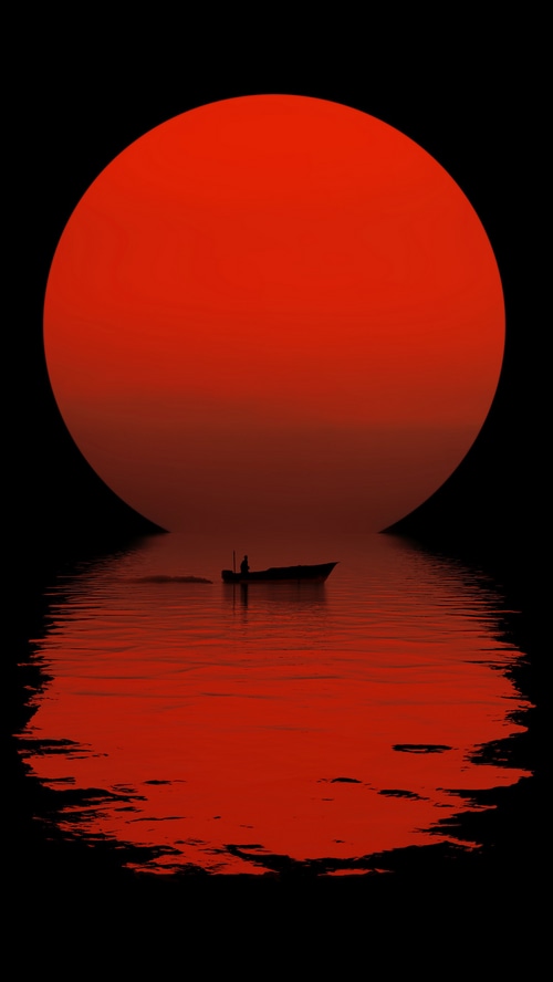 A lone boat on the water under a large red sun