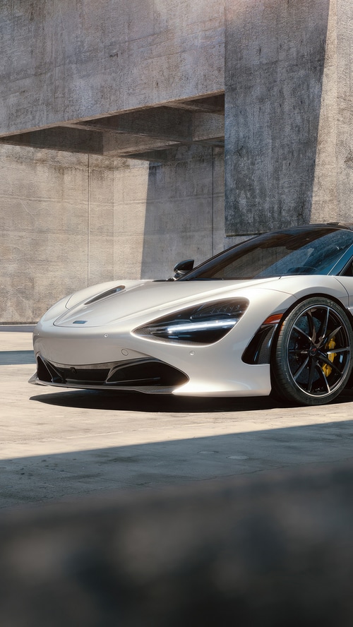 McLaren 720S parked near concrete structure
