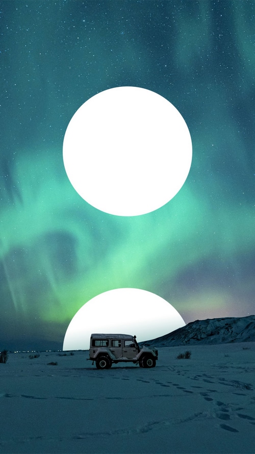 Jeep under Aurora Borealis with two moons