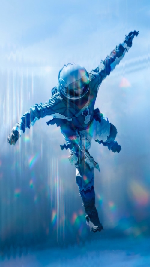Astronaut floating in a distorted blue sky