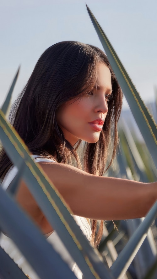 Eiza Gonzalez in a photoshoot with agave plants