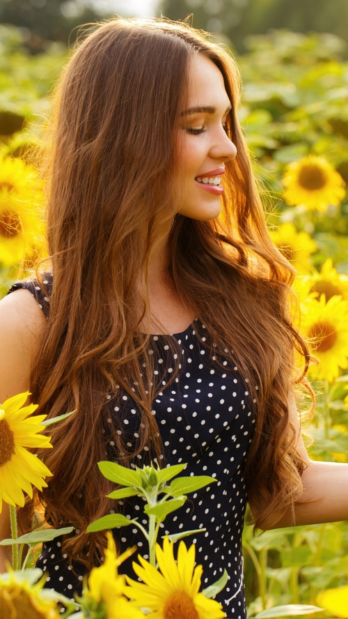 Girl in a sunflower field