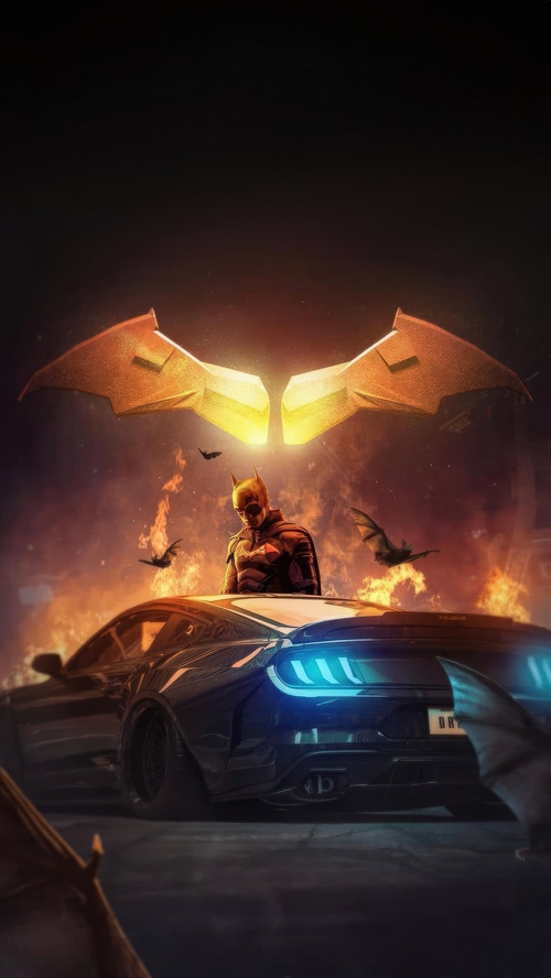 Batman and his car with bat symbol and flames