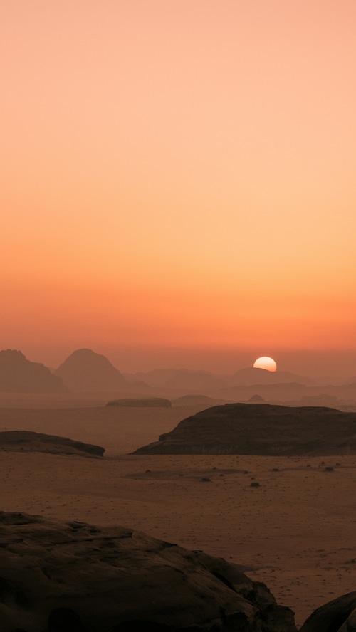 Desert sunset over mountains