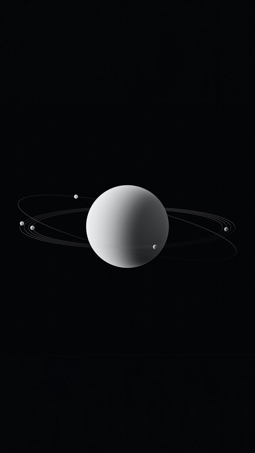 A planet with rings and moons in dark space