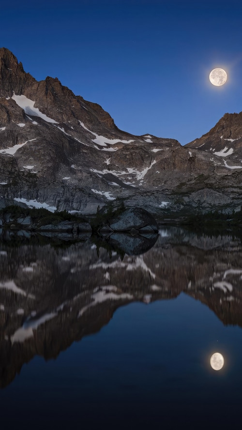 Moonlit Mountains Reflected in a Calm Lake