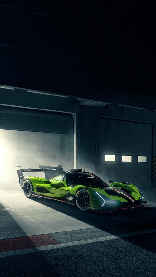 Lamborghini SC63 race car in a garage