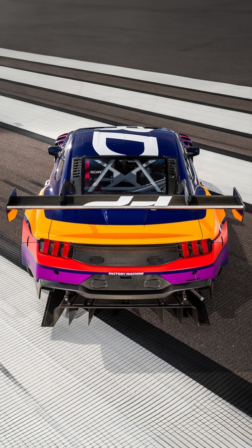 Ford Mustang GT3 race car with colorful livery